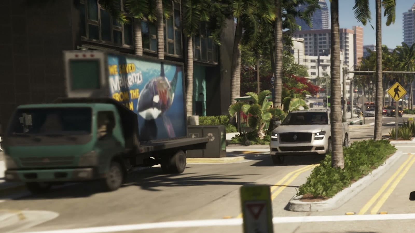 Billboard truck showing an orca and the slogan "We saved Makenzi from the ocean" on a Vice City street