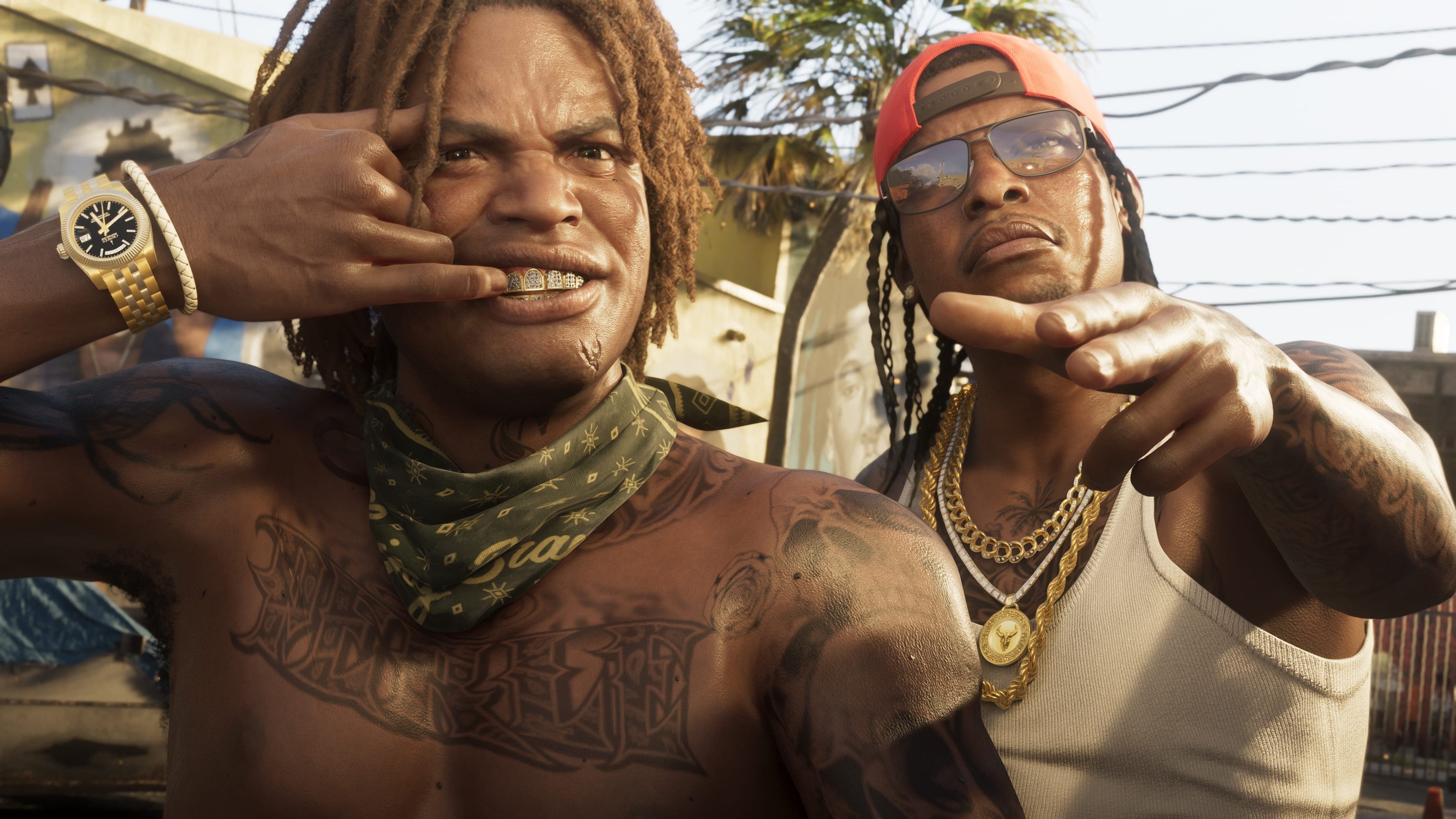 Two men with dreadlocks, chains and sunglasses posing for the camera on a sunny street.