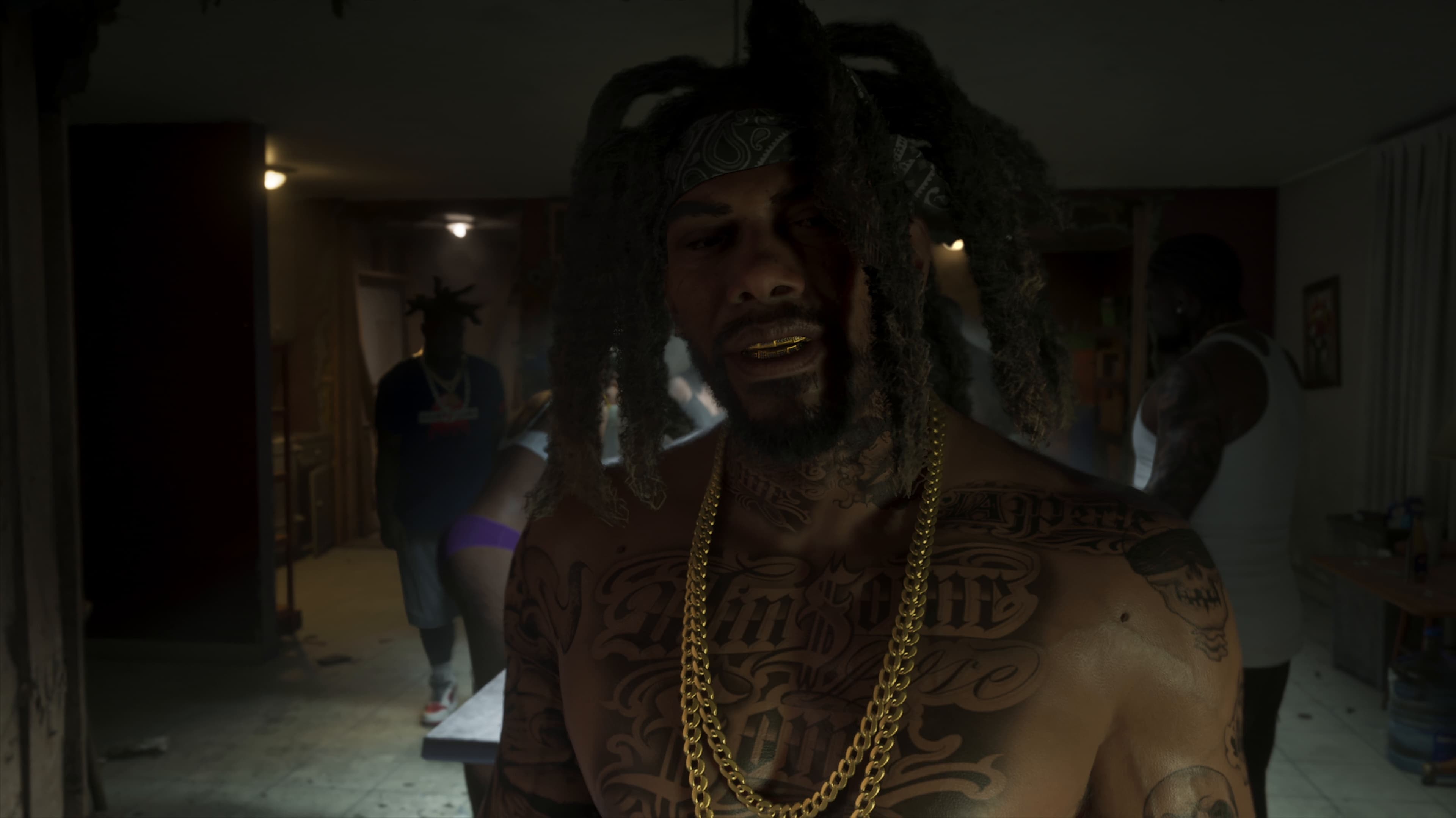 Raymond, with dreadlocks and gold chains, in the Venture Apartments lab